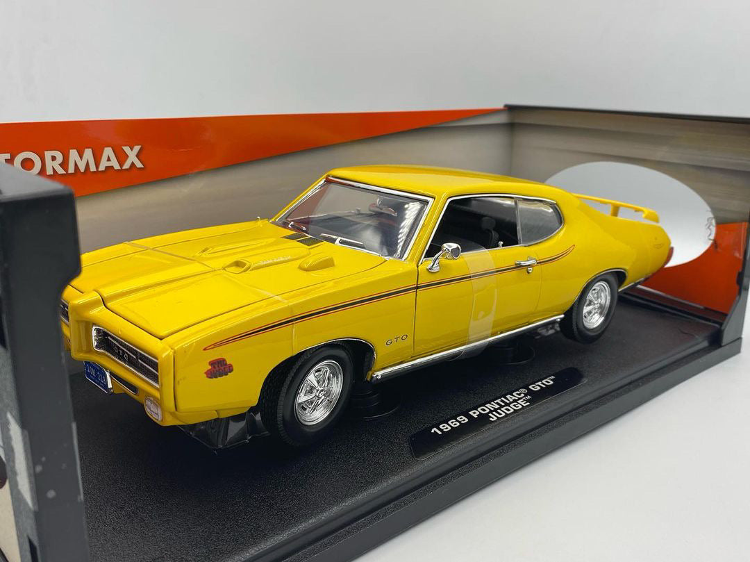 Motormax Pontiac GTO Judge 1969 Coupe Orange – 1/18 Oldtimer-Modellauto Mit Funktionen Motormax Pontiac GTO Judge 1969 Coupe Orange – 1/18 Oldtimer-Modellauto Mit Funktionen